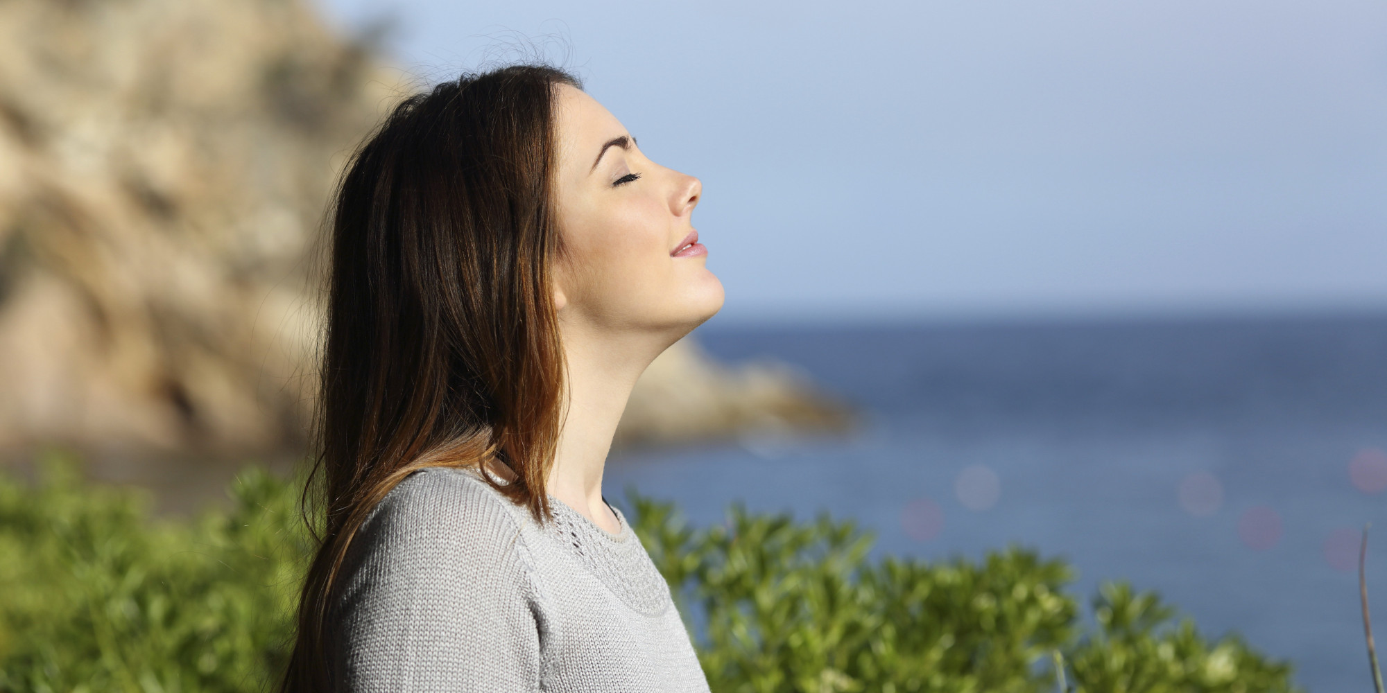 Woman Breathing Fresh Air Relaxed On Vacation